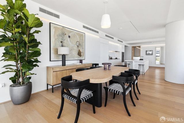 a kitchen with a sink and a refrigerator