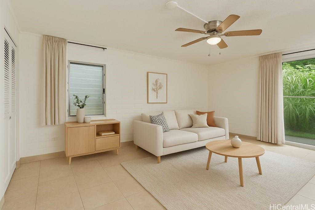45-535 Luluku Road, Unit G2 Kaneohe, HI 96744 - Photo 1 of 12 a living room with furniture and a window
