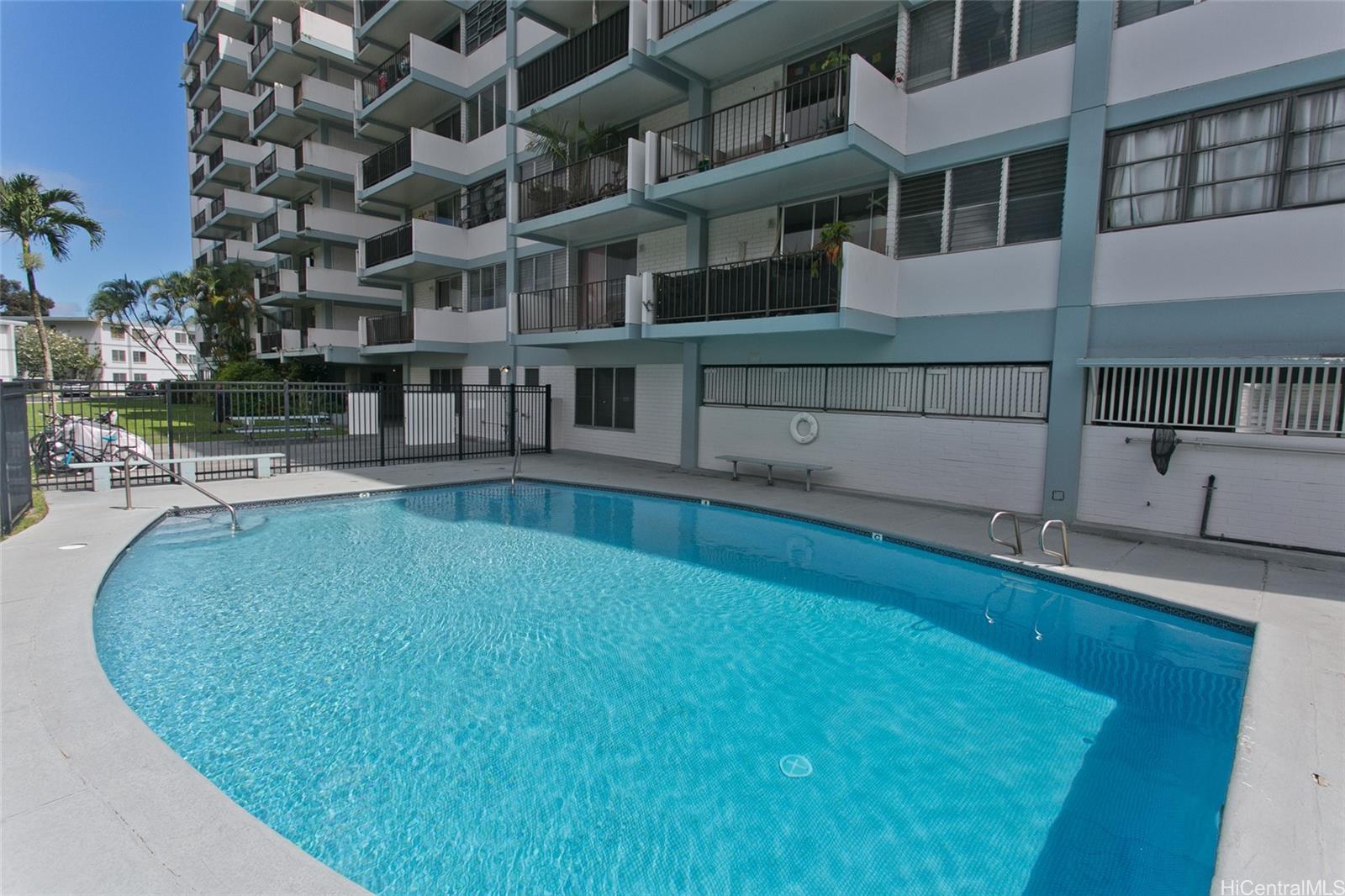 45-535 Luluku Road, Unit G2 Kaneohe, HI 96744 - Photo 12 of 12 a view of a house with a swimming pool