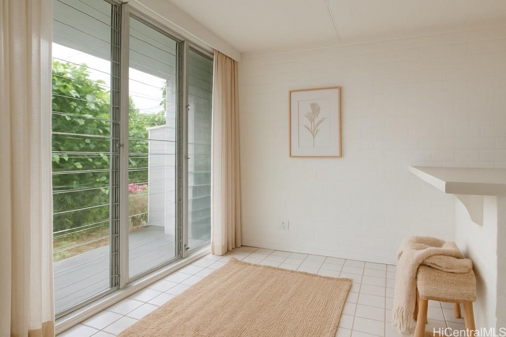 45-535 Luluku Road, Unit G2 Kaneohe, HI 96744 - Photo 3 of 12 a view of livingroom with furniture and windows