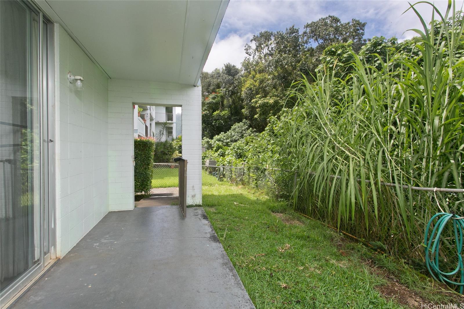 45-535 Luluku Road, Unit G2 Kaneohe, HI 96744 - Photo 9 of 12 a view of a back yard