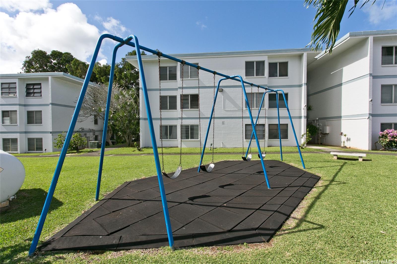 45-535 Luluku Road, Unit G2 Kaneohe, HI 96744 - Photo 10 of 12 a view of a house with a backyard