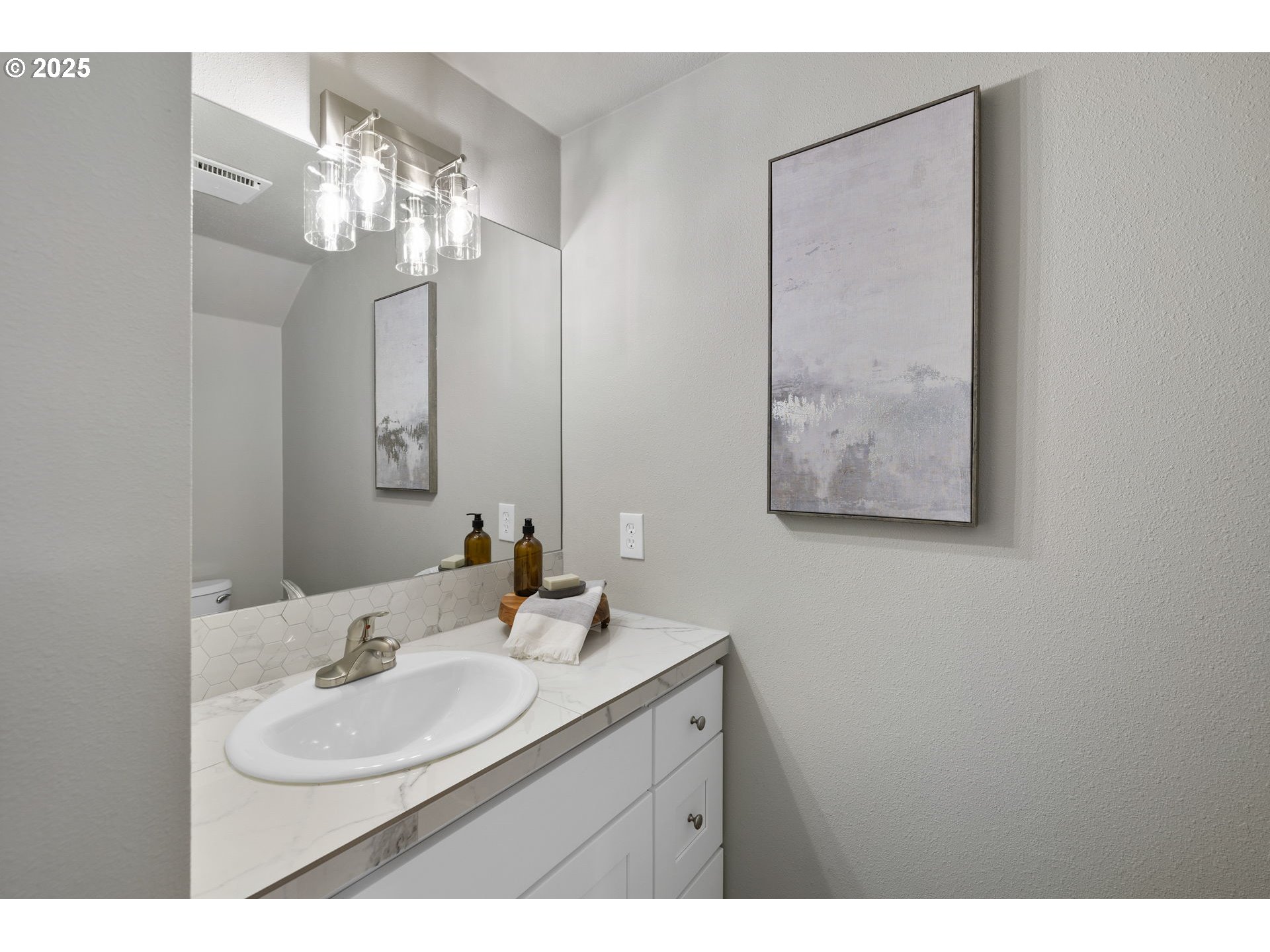 3240 Northeast 29th Street Gresham, OR 97030 - Photo 25 of 29 a bathroom with a sink and a mirror