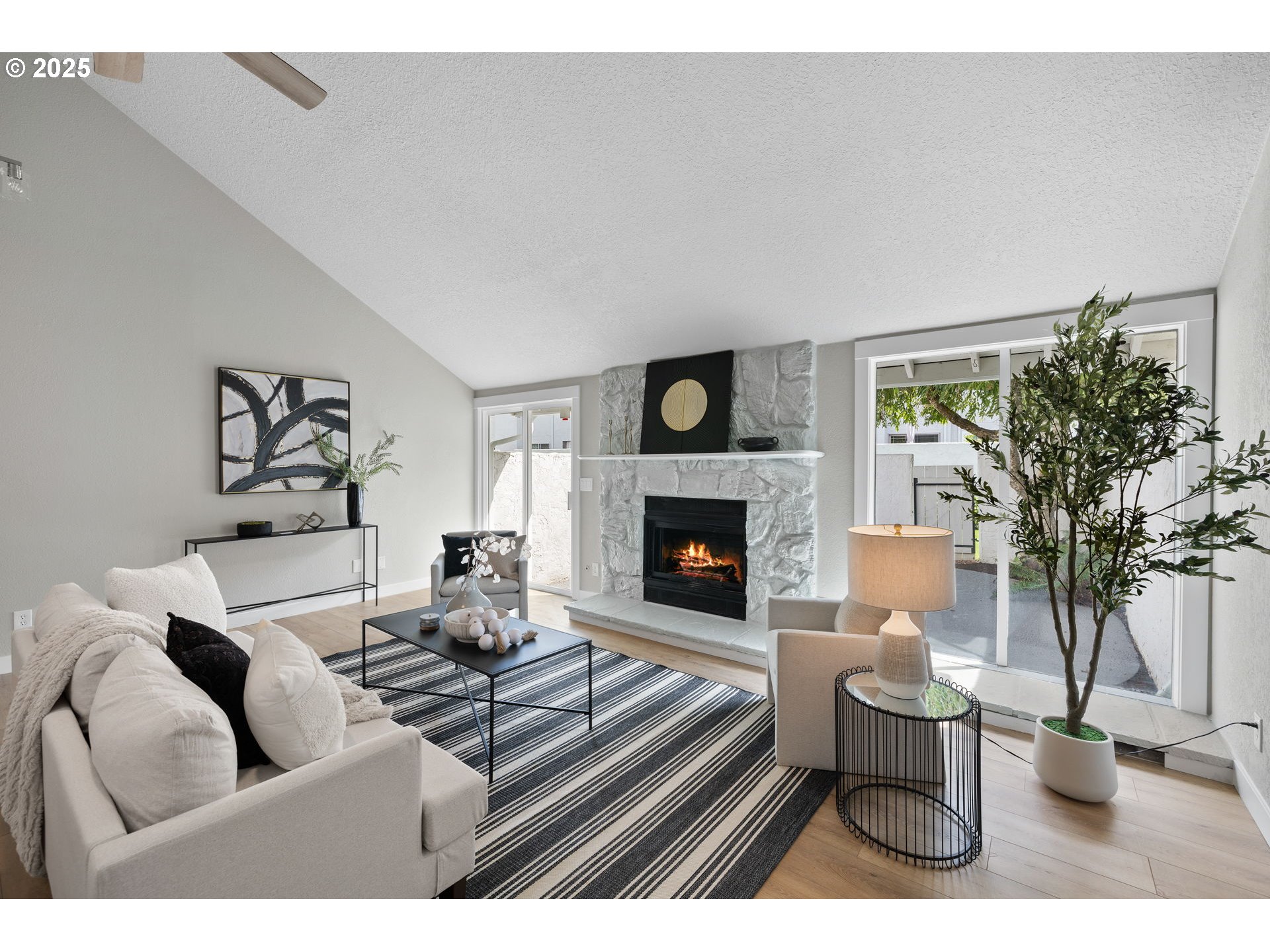 3240 Northeast 29th Street Gresham, OR 97030 - Photo 7 of 29 a living room with furniture and a fireplace