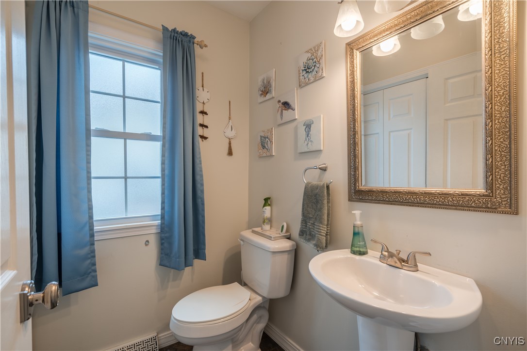 4976 Surrey Lane Clay, NY 13088 - Photo 18 of 47 Half bathroom on first floor, conveniently located
