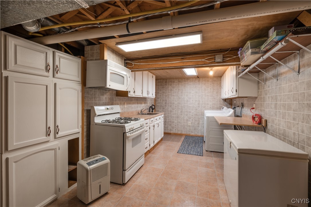 4976 Surrey Lane Clay, NY 13088 - Photo 40 of 47 Second kitchen area in the lower level. All applia