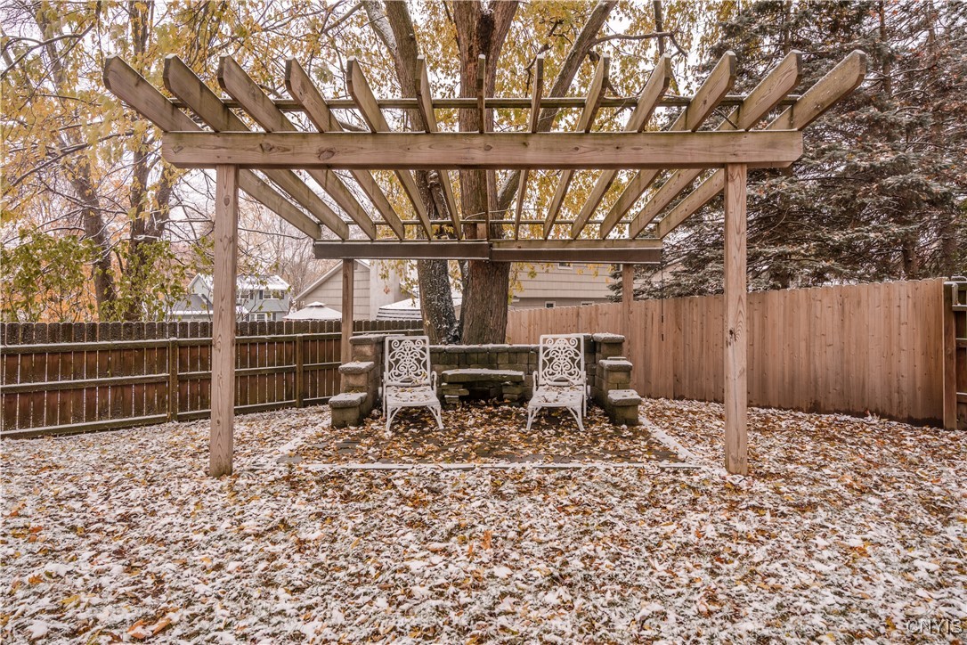 4976 Surrey Lane Clay, NY 13088 - Photo 4 of 47 Very peaceful sitting area under this nice pergola