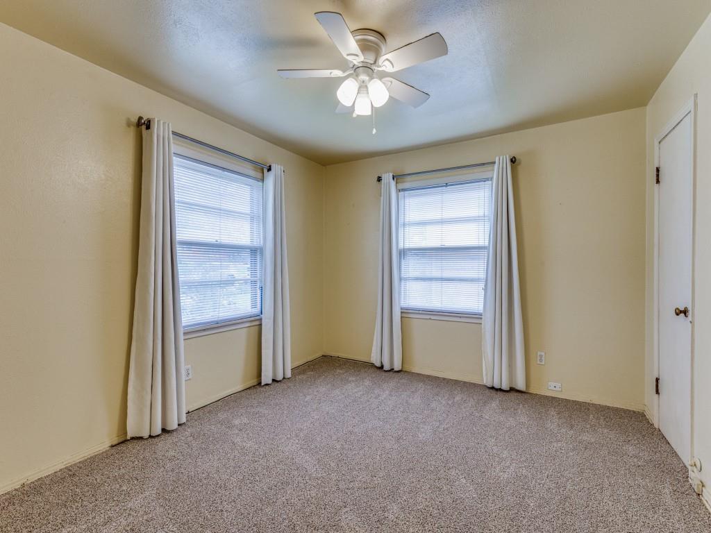 5317 Redbud Lane Fort Worth, TX 76114 - Photo 13 of 16 an empty room with closet and a ceiling fan