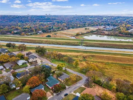 an aerial view of residential building with ocean