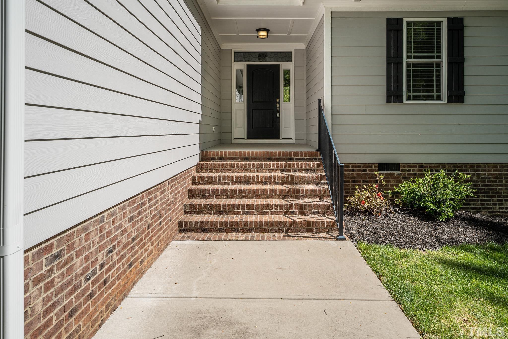 755 Oaks Lane Road Timberlake, NC 27583 - Photo 54 of 57 a view of house with entryway