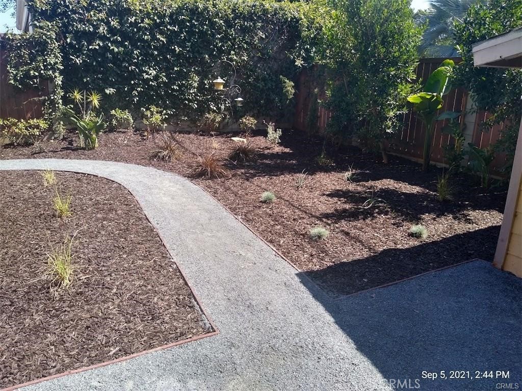 34591 Via Verde, Unit A Dana Point, CA 92624 - Photo 12 of 13 a view of a backyard of a house