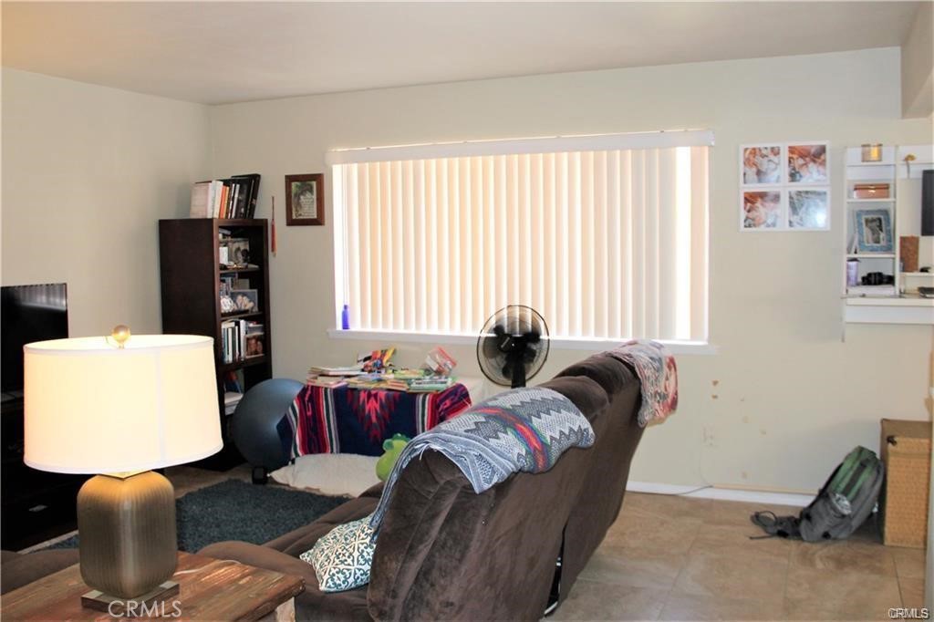 34591 Via Verde, Unit A Dana Point, CA 92624 - Photo 5 of 13 a living room with furniture and a window