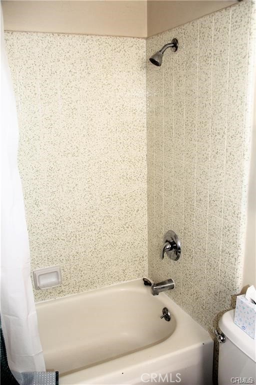 34591 Via Verde, Unit A Dana Point, CA 92624 - Photo 9 of 13 a bathroom with a bathtub and shower