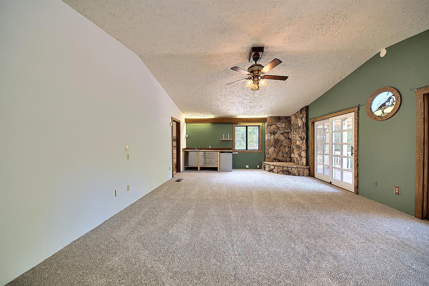 731 Dam Road Murphys, CA 95247 - Photo 23 of 80 Master bedroom is large with walk in cedar wood closets and french doors opening to balcony - nice views
