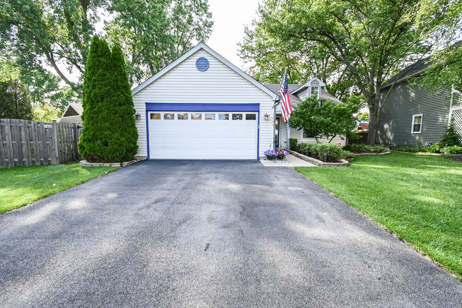 1333 Regency Lane Round Lake, IL 60073 - Photo 3 of 31 a view of a house with a yard and a garage