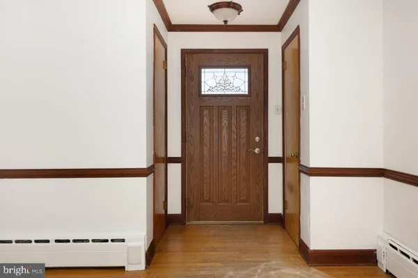 a view of a room with a large window