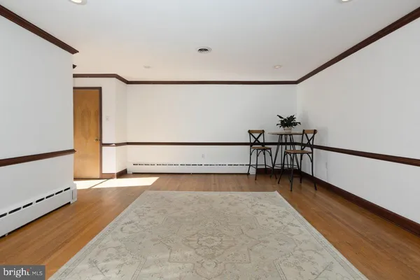 a view of a livingroom with furniture and a fireplace