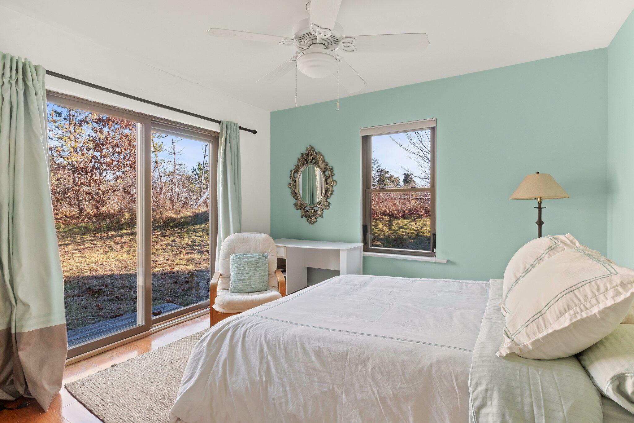 18 Bay View Road Truro, MA 02666 - Photo 17 of 30 a bedroom with a large bed and a window