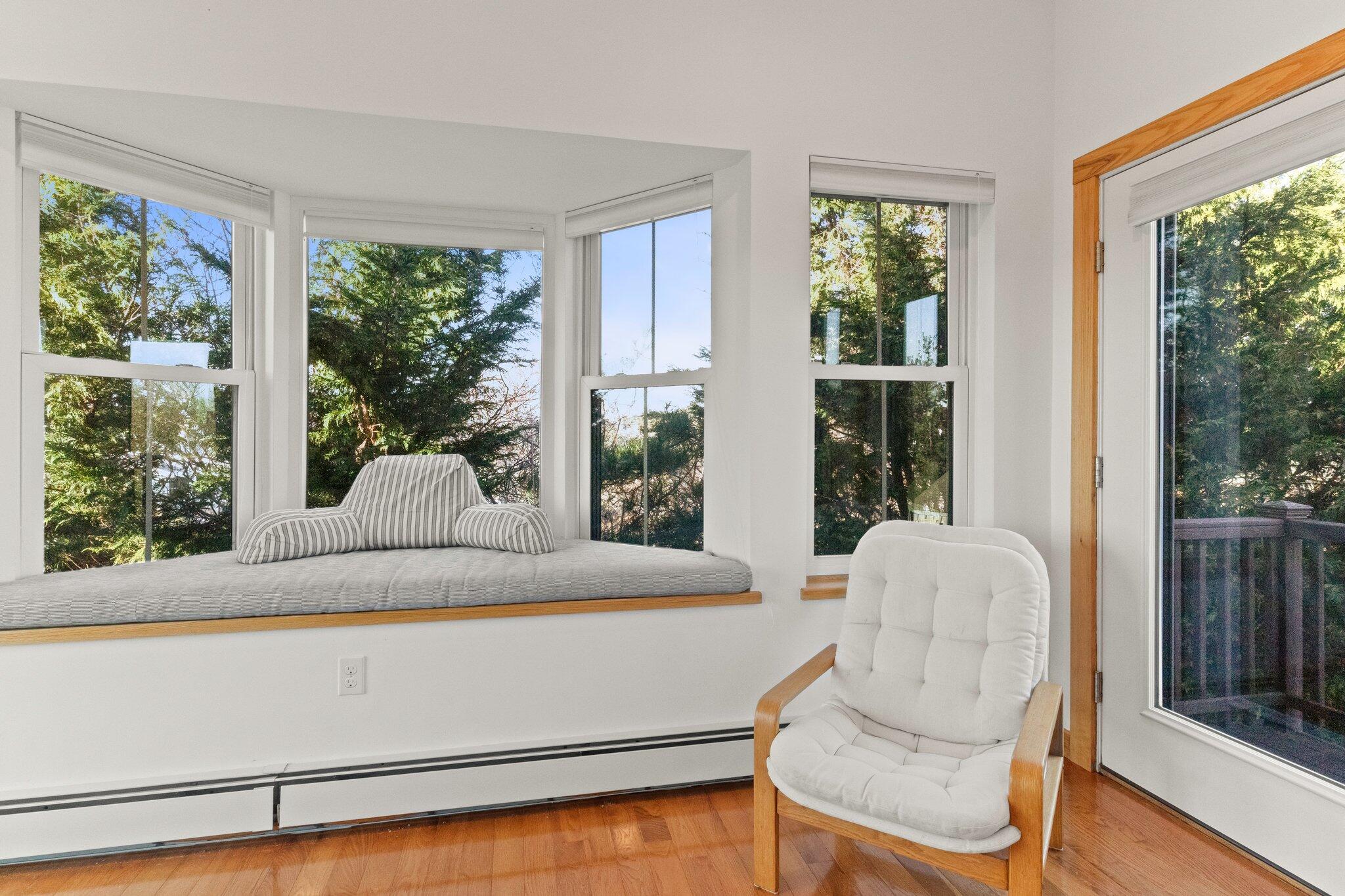 18 Bay View Road Truro, MA 02666 - Photo 21 of 30 a living room with a large window and furniture