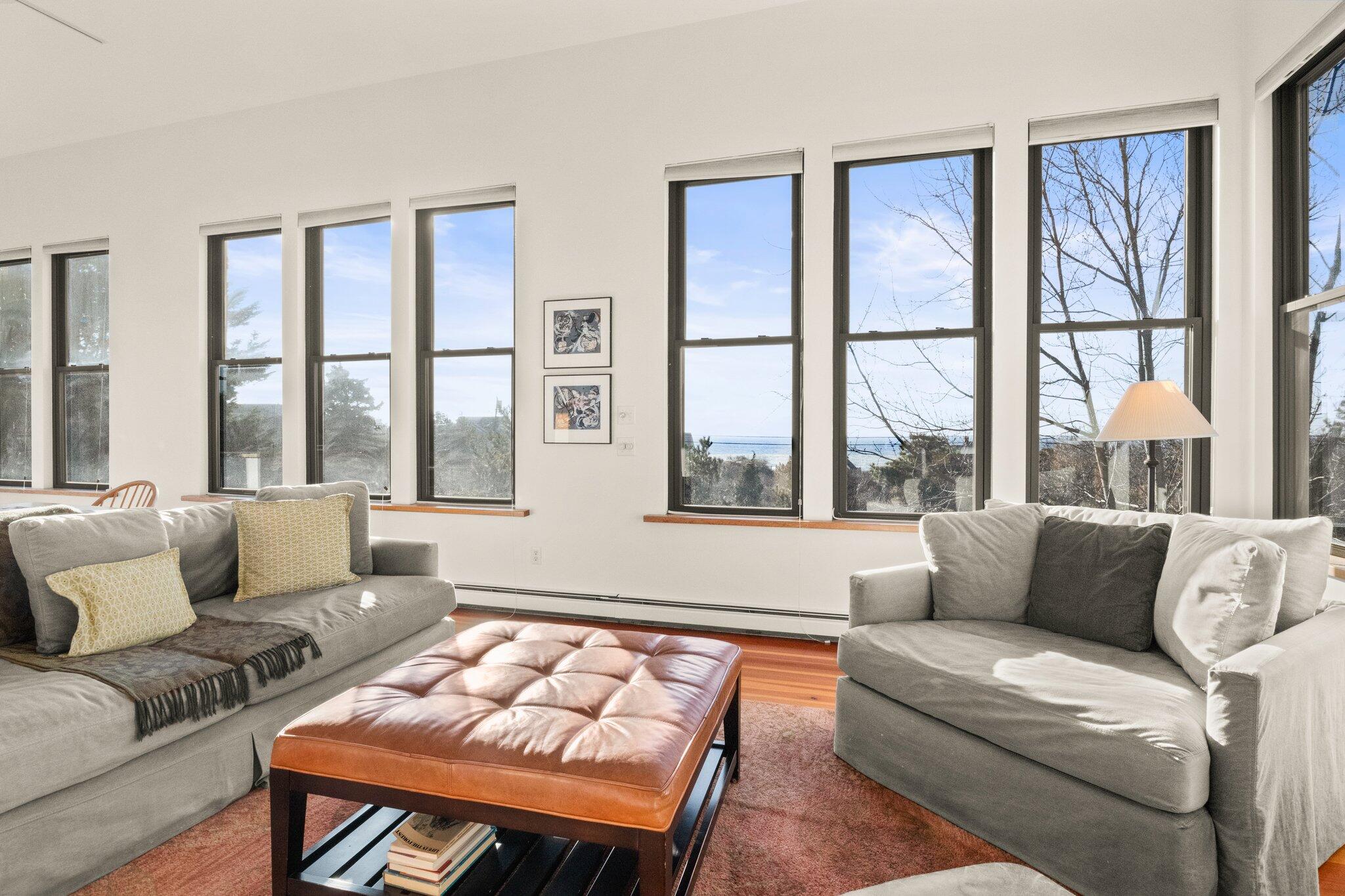 18 Bay View Road Truro, MA 02666 - Photo 3 of 30 a living room with furniture and a large window