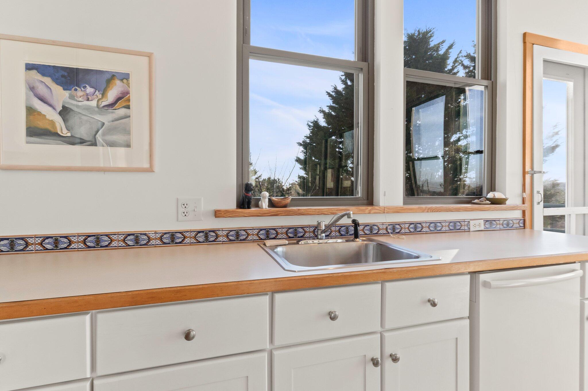 18 Bay View Road Truro, MA 02666 - Photo 9 of 30 a bathroom with a sink and a mirror