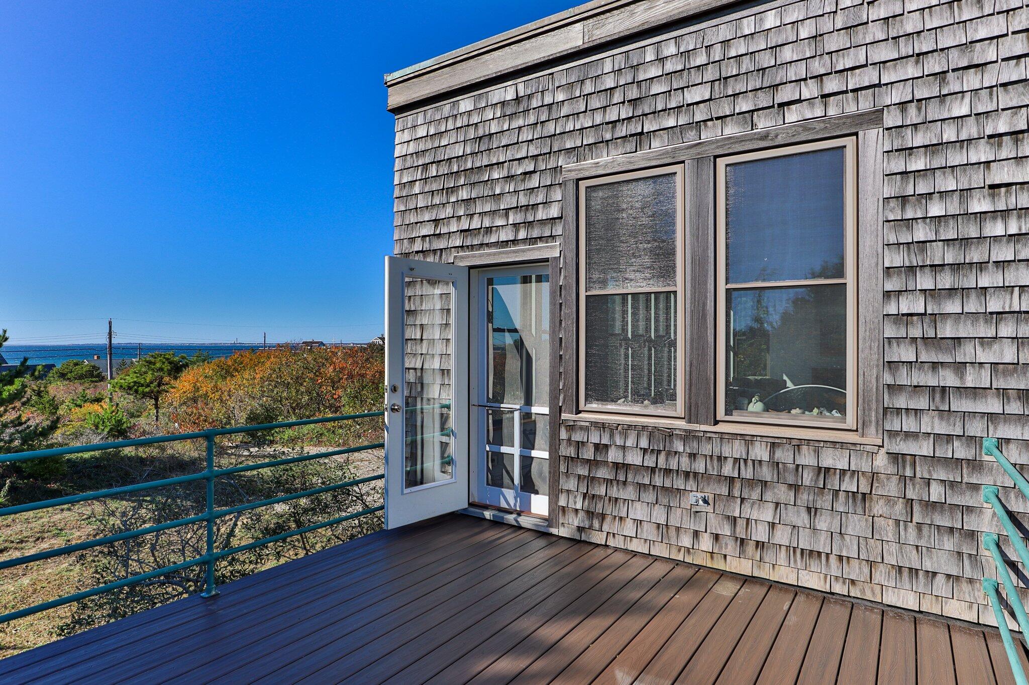 18 Bay View Road Truro, MA 02666 - Photo 10 of 30 a view of a house with a large window