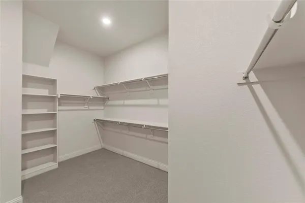 a storage room with washer and dryer