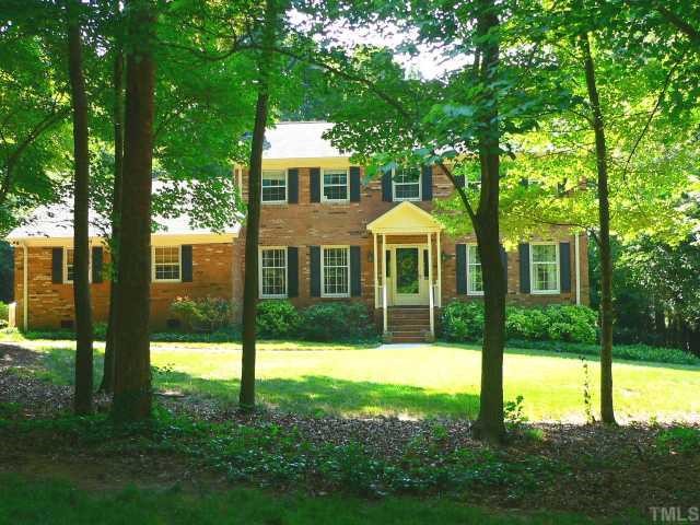 5404 Fairoaks Road Durham, NC 27712 - Photo 1 of 12 a front view of a house with yard