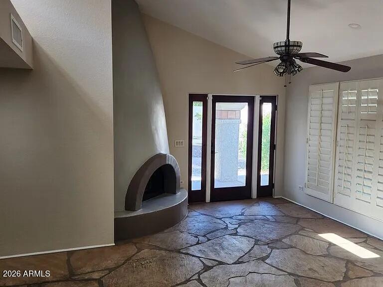 4615 East Monte Way Phoenix, AZ 85044 - Photo 6 of 18 a view of a livingroom with a staircase