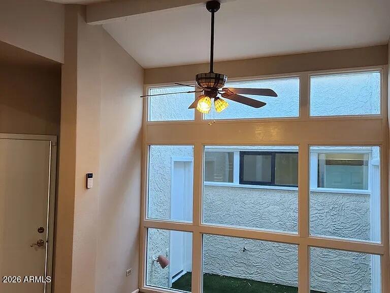 4615 East Monte Way Phoenix, AZ 85044 - Photo 8 of 18 a view of a livingroom with a ceiling fan