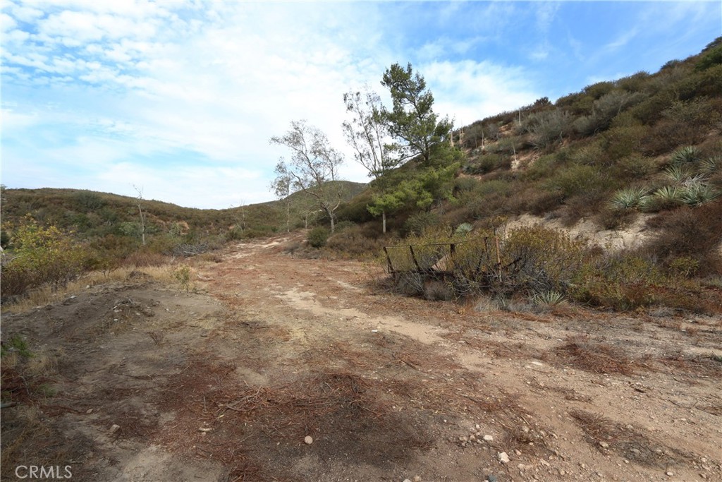 0 Na San Bernardino, CA 92407 - Photo 7 of 10 a view of a dry yard with mountains in the background