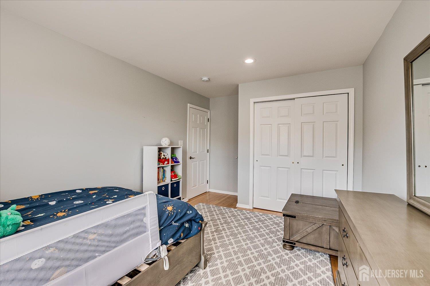 39 Rojewski Way Sayreville, NJ 08859 - Photo 28 of 40 a bedroom with bed and walk in closet