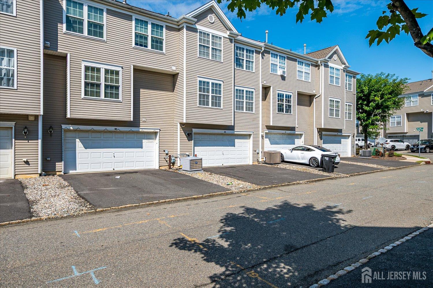 39 Rojewski Way Sayreville, NJ 08859 - Photo 34 of 40 a building with view of the street