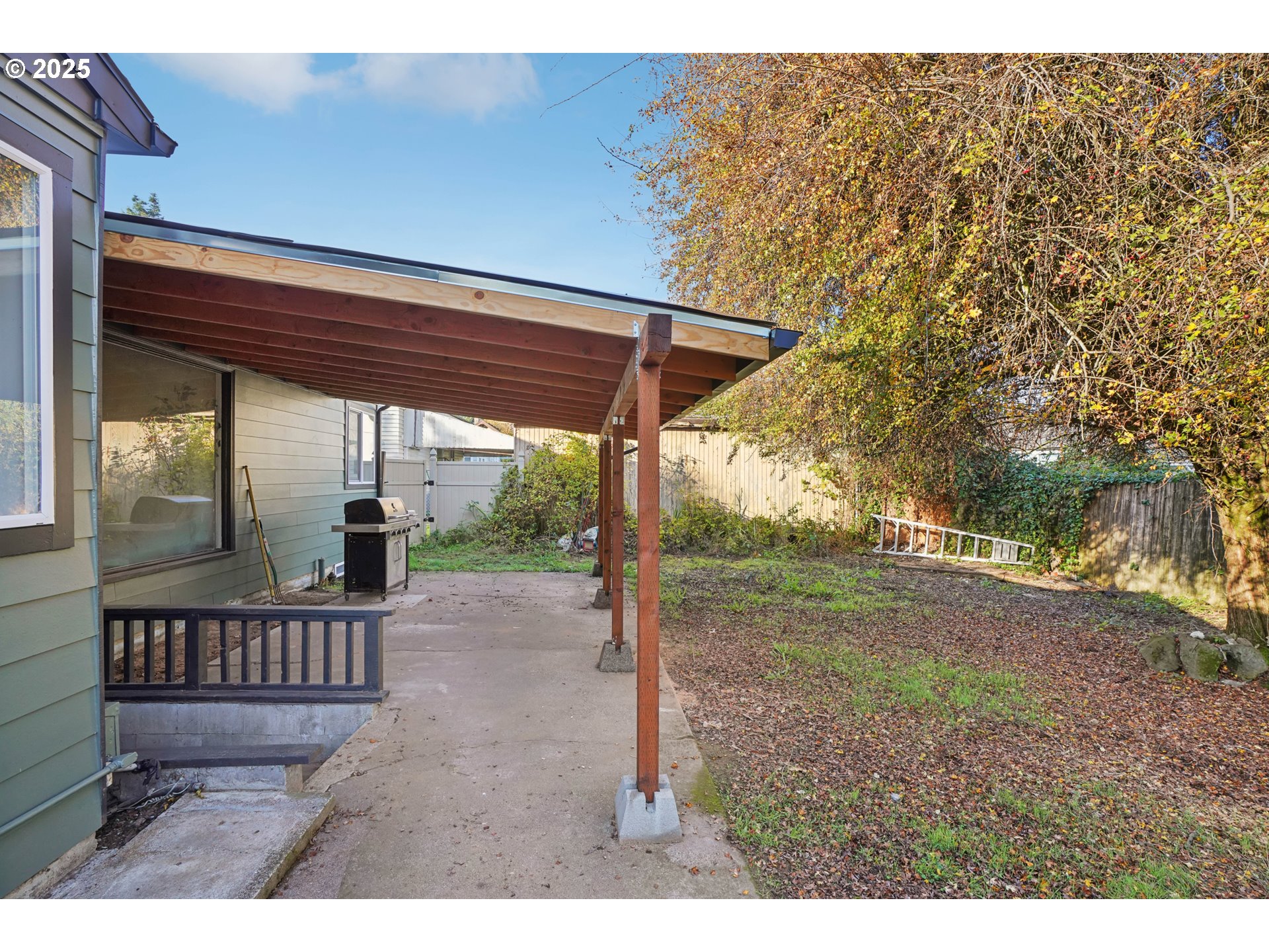 1315 North Russet Street Portland, OR 97217 - Photo 19 of 23 a view of a house with backyard and porch