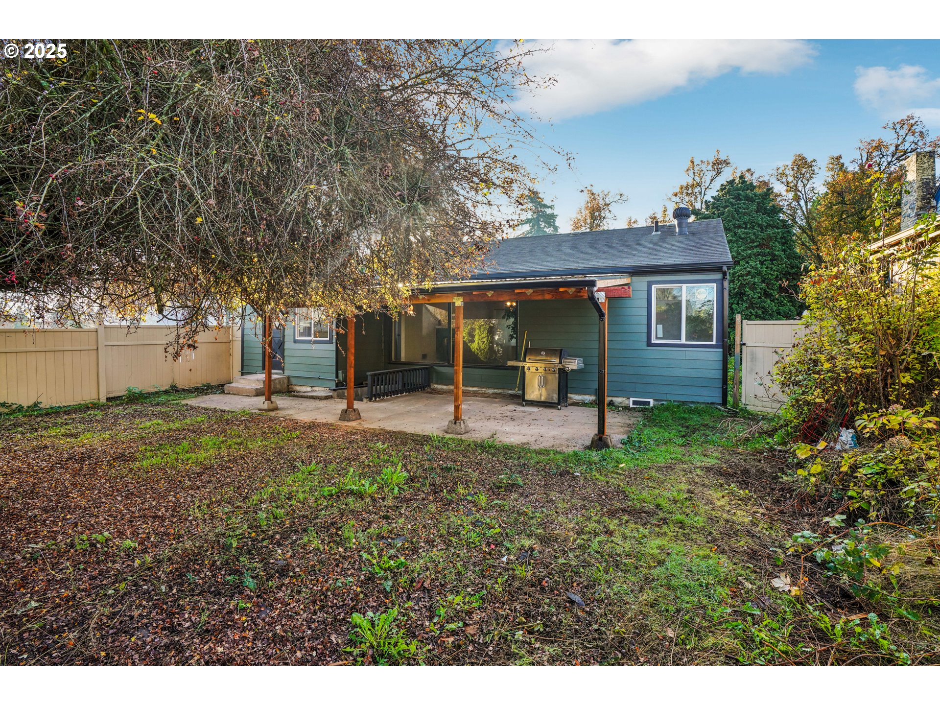 1315 North Russet Street Portland, OR 97217 - Photo 20 of 23 a view of a house with a backyard