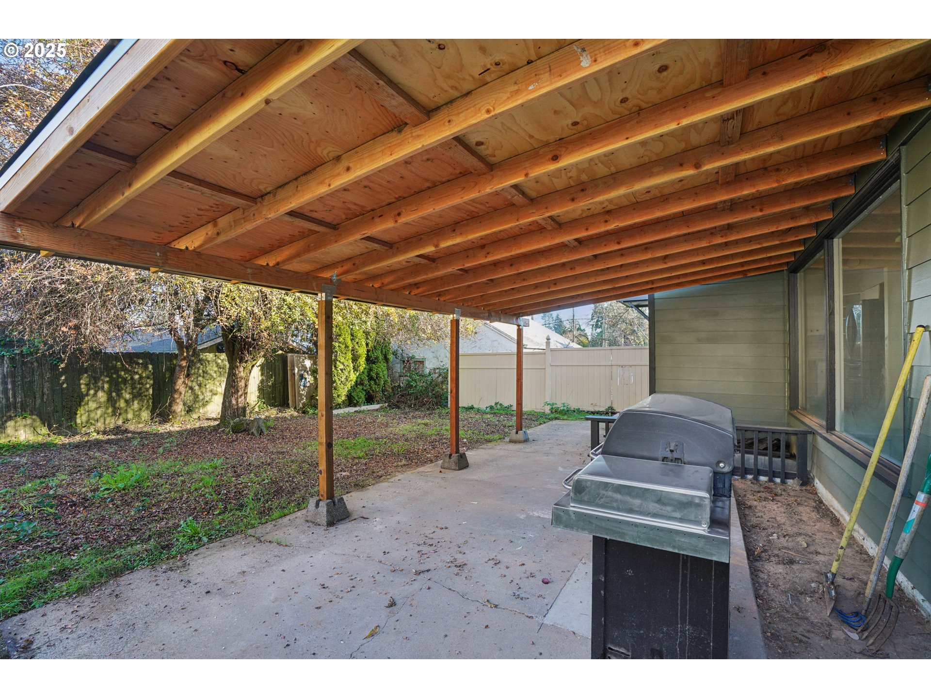 1315 North Russet Street Portland, OR 97217 - Photo 22 of 23 a backyard of a house with swing and slide