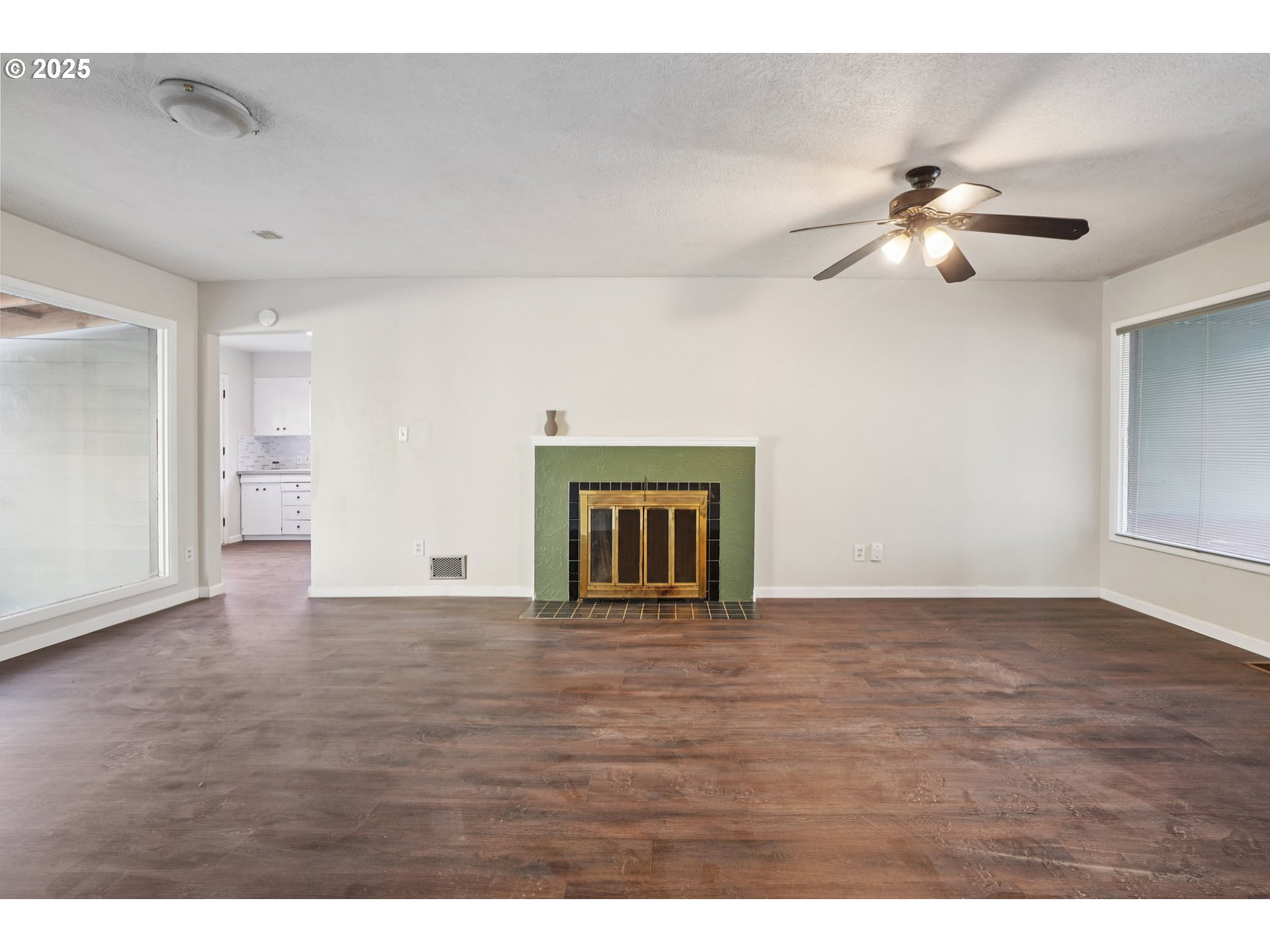 1315 North Russet Street Portland, OR 97217 - Photo 4 of 23 a view of an empty room with window and wooden floor