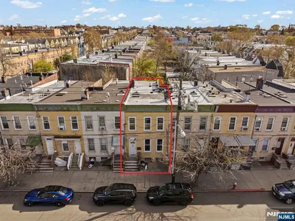 a view of a city with tall buildings