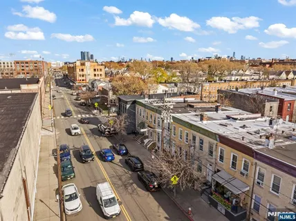 a view of city with ocean