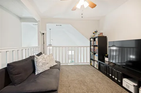 a view of a livingroom with furniture and a living room