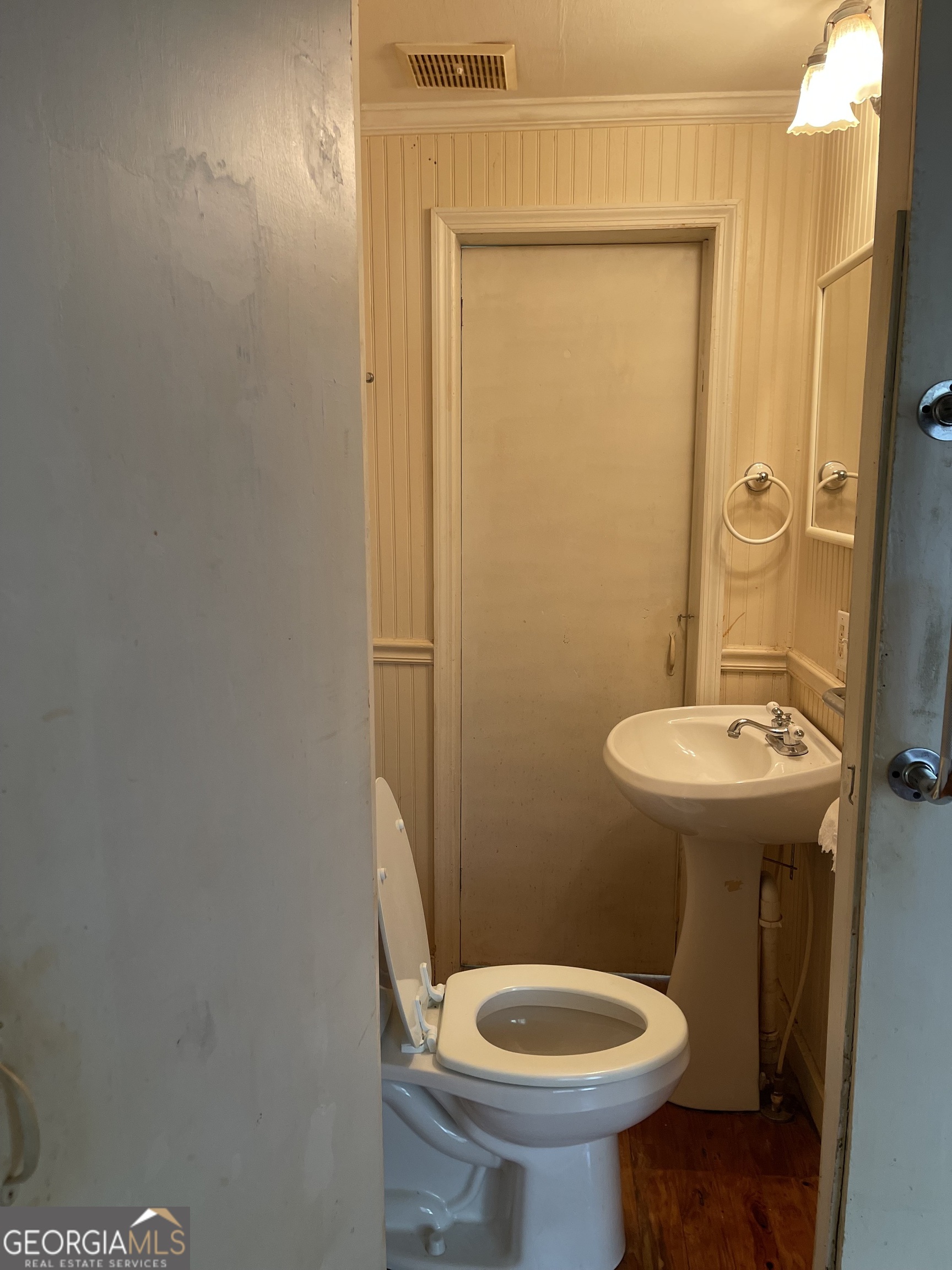 6505 23rd Avenue Valley, AL 36854 - Photo 18 of 49 a bathroom with a sink toilet and a mirror