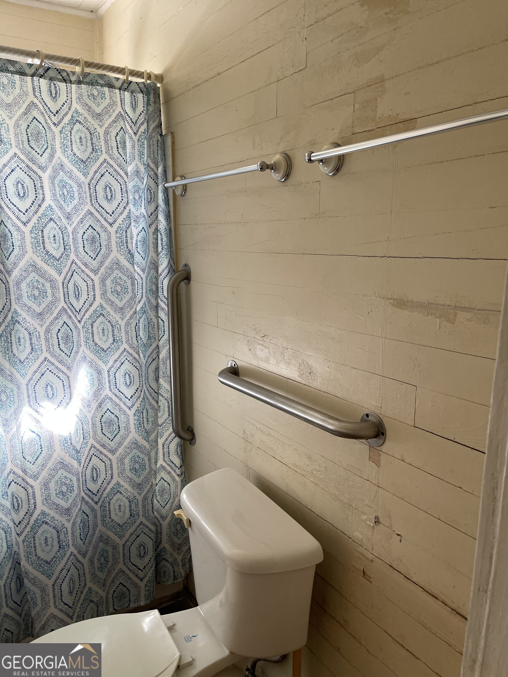 6505 23rd Avenue Valley, AL 36854 - Photo 29 of 49 a bathroom with a toilet and shower