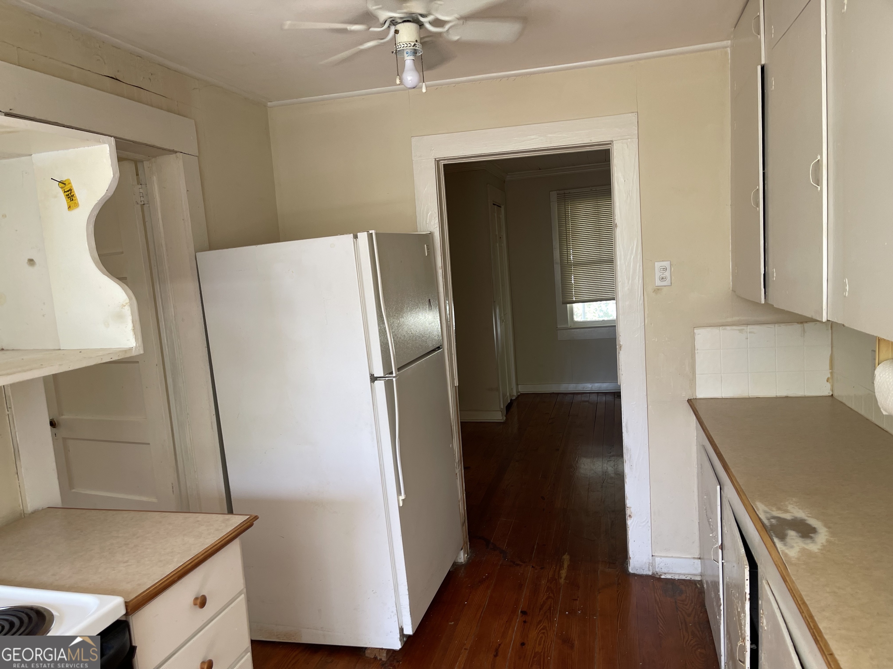 6505 23rd Avenue Valley, AL 36854 - Photo 3 of 49 a kitchen with a refrigerator and a stove top oven