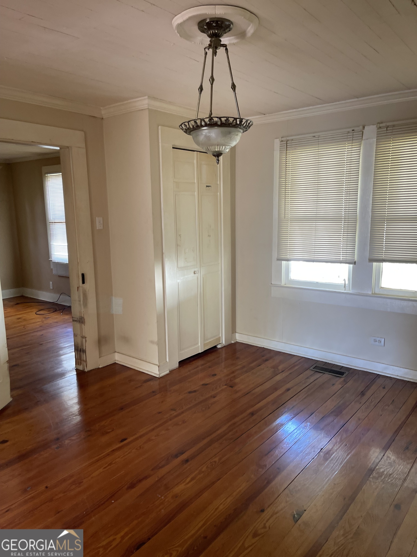 6505 23rd Avenue Valley, AL 36854 - Photo 4 of 49 a view of empty room with wooden floor and window