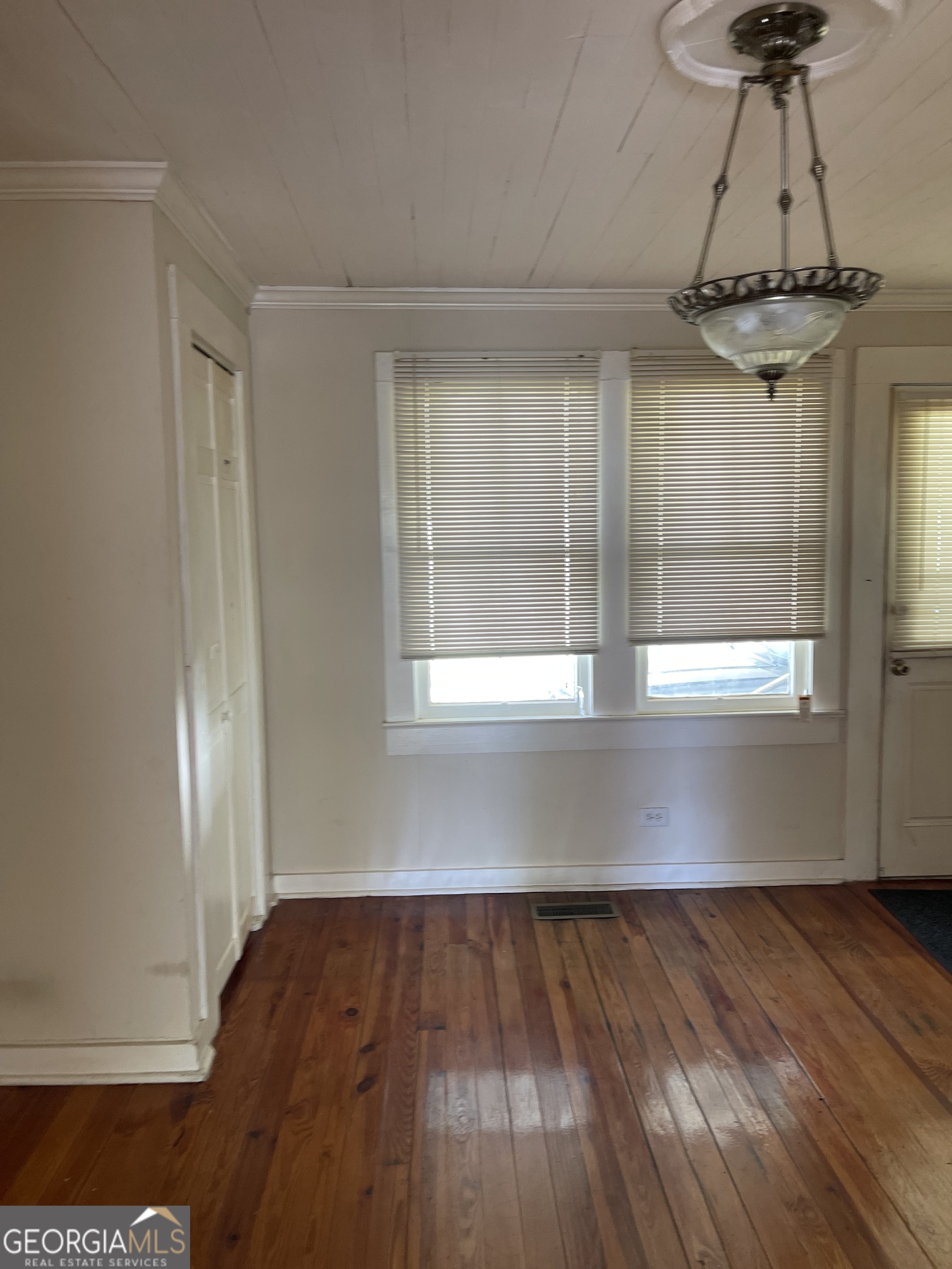 6505 23rd Avenue Valley, AL 36854 - Photo 5 of 49 a view of empty room with wooden floor and fan