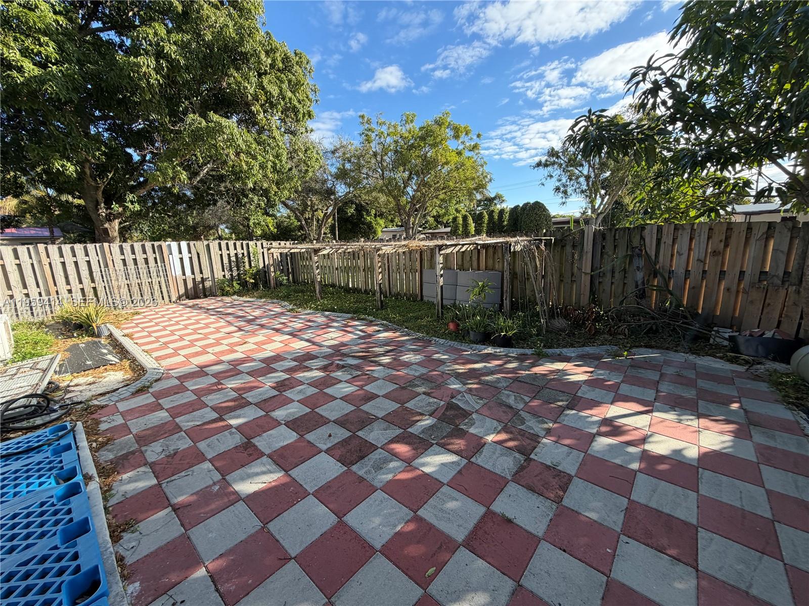 4210 Southwest 10th Street Plantation, FL 33317 - Photo 17 of 19 a view of a backyard