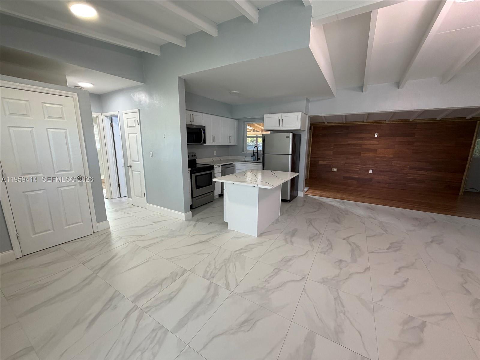 4210 Southwest 10th Street Plantation, FL 33317 - Photo 3 of 19 a view of a hallway with storage space