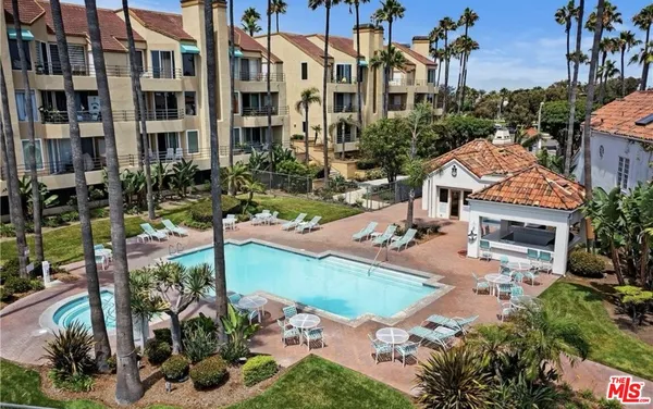 a view of houses with yard