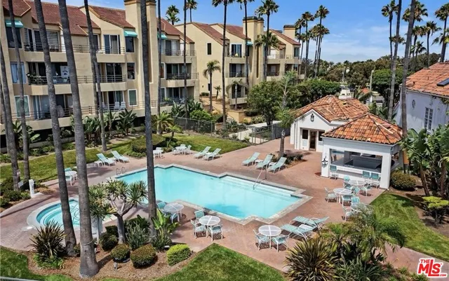 a view of houses with yard