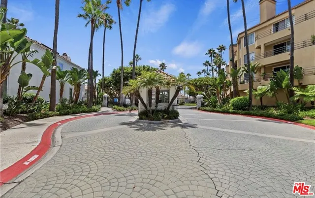 a view of building with yard and staircase